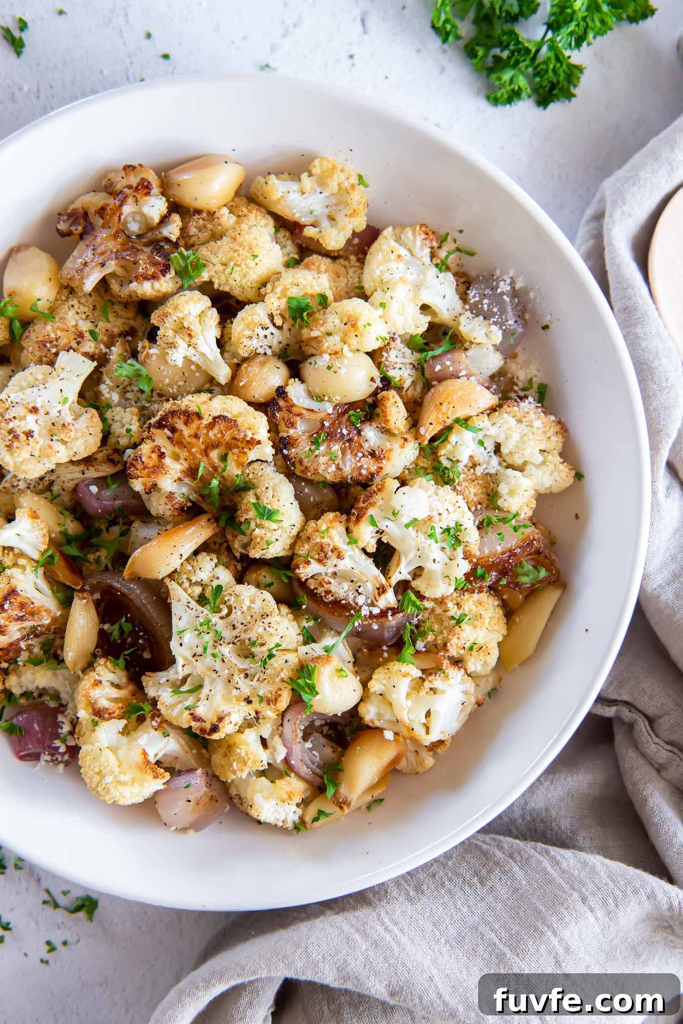 October Produce Guide: Fruits and Vegetables in Season 14 Roasted cauliflower in a white bowl