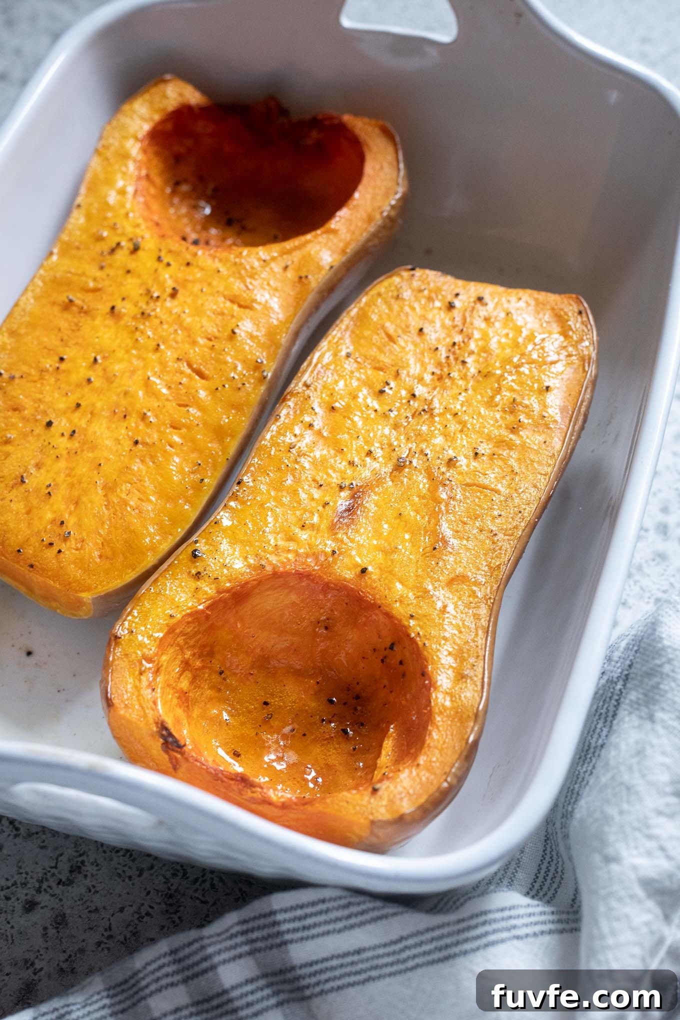 October Produce Guide: What's in Season Now 12 Roasted whole butternut squash in a baking dish