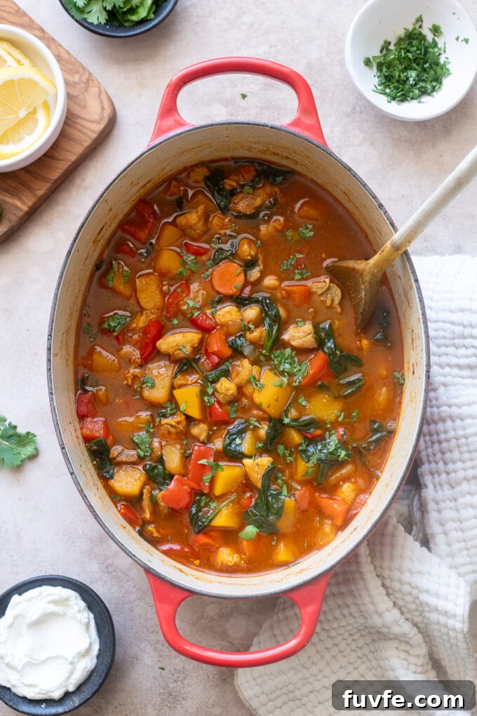 Moroccan soup with chicken and chickpeas in a Dutch oven.