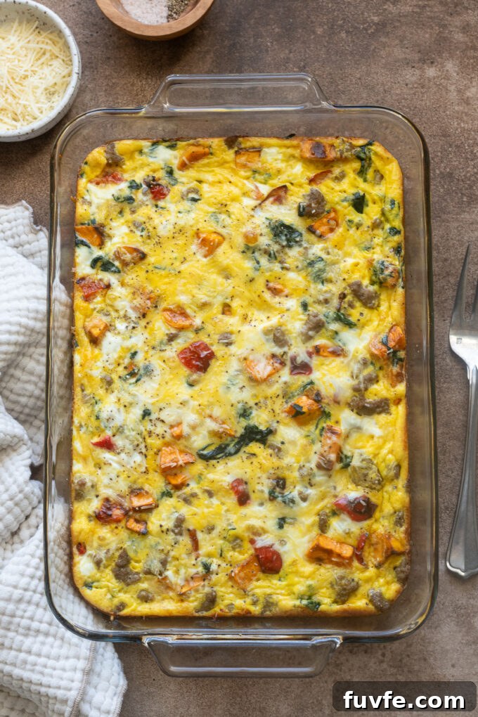Overnight Sausage and Egg Breakfast Casserole 11 Sausage breakfast casserole in baking dish.
