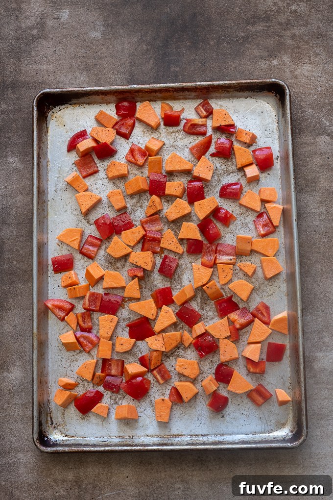 Overnight Sausage and Egg Breakfast Casserole 5 Sweet potato and red bell pepper before roasting for breakfast casserole.