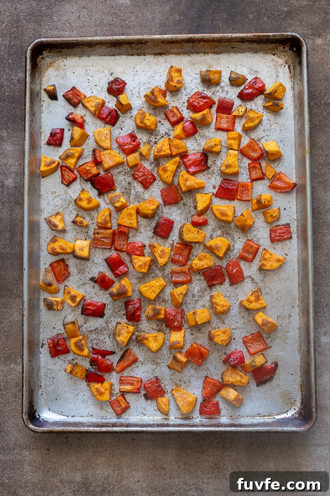 Overnight Sausage and Egg Breakfast Casserole 6 Roasted sweet potato and red bell pepper for breakfast sausage casserole.