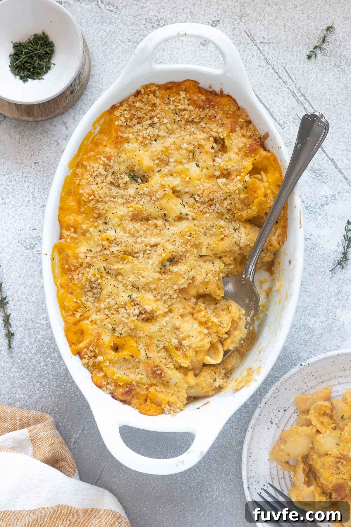 December Produce Guide: What's in Season Now 14 Butternut squash mac and cheese with breadcrumbs on top.