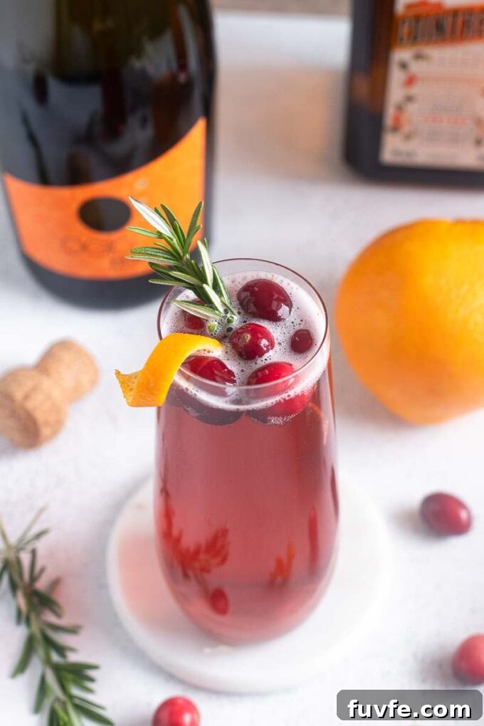 Poinsettia Cocktail Recipe: Cranberry Champagne Holiday Drink 11 Poinsettia drinks with cranberry juice, Cointreau and champagne or prosecco.