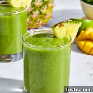 Tropical kale smoothie in a glass.