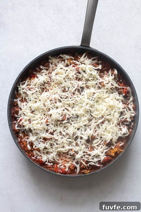 Spaghetti squash casserole in skillet before baking.