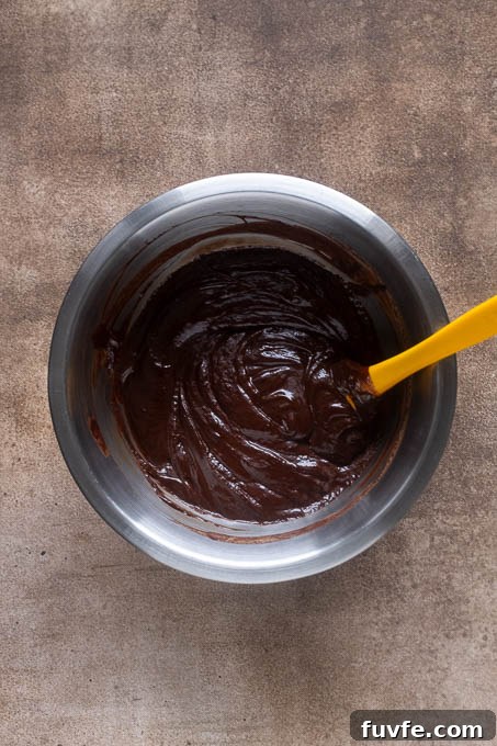 Chocolate ganache in a heatproof bowl.