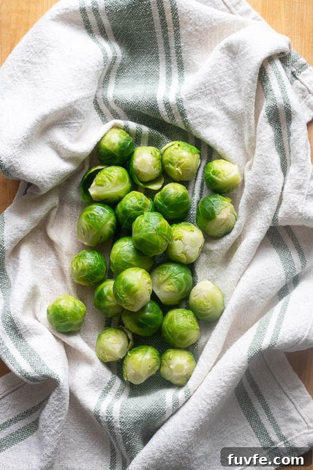 Dry the boiled brussels sprouts in a towel.