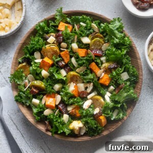 Roasted Winter Vegetables and Kale Salad 11 Winter roasted vegetable kale salad in a serving bowl.