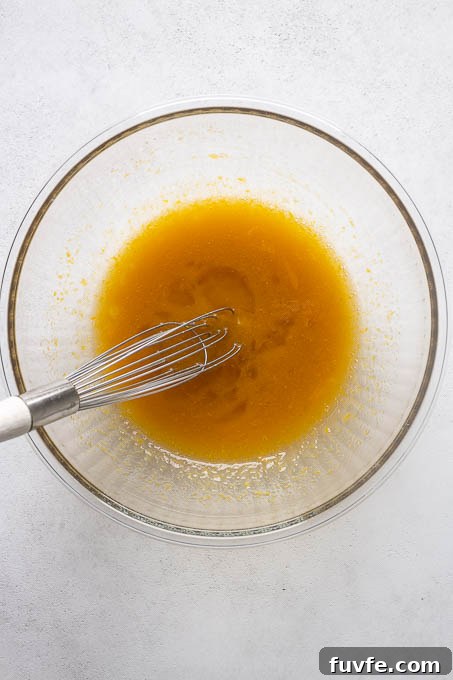 Wet ingredients for almond flour lemon loaf cake.