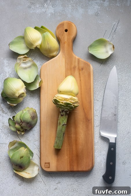 Carciofi alla Romana: Roman-Style Artichoke Recipe 6 Artichoke with tough outer leaves removed for Roman artichokes.