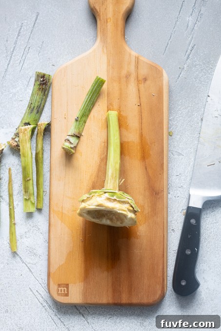 Carciofi alla Romana: Roman-Style Artichoke Recipe 8 Stem and base of Roman artichokes trimmed.