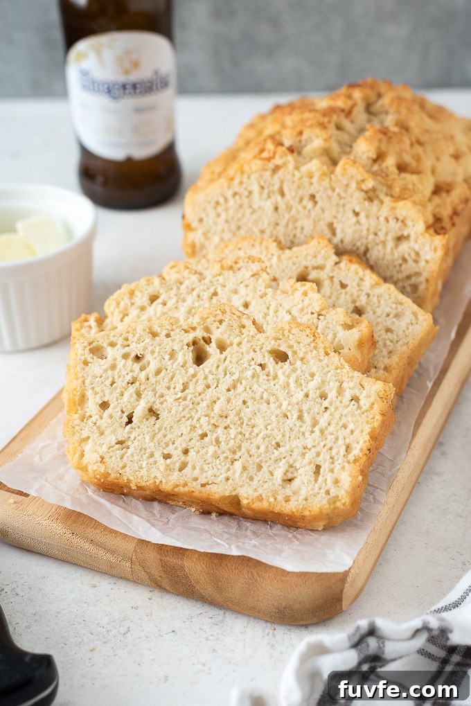Sliced beer bread on a cutting board