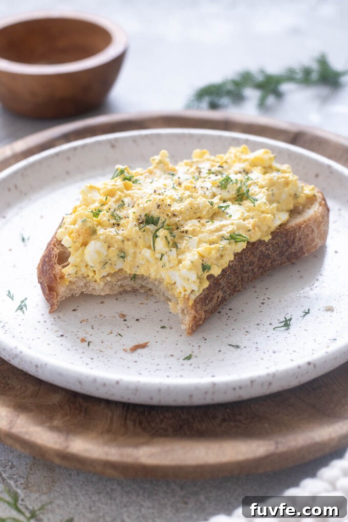 Simple egg salad with dill on toasted sourdough.
