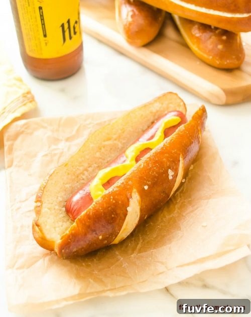 Soft pretzel hot dog bun with hot dog and mustard