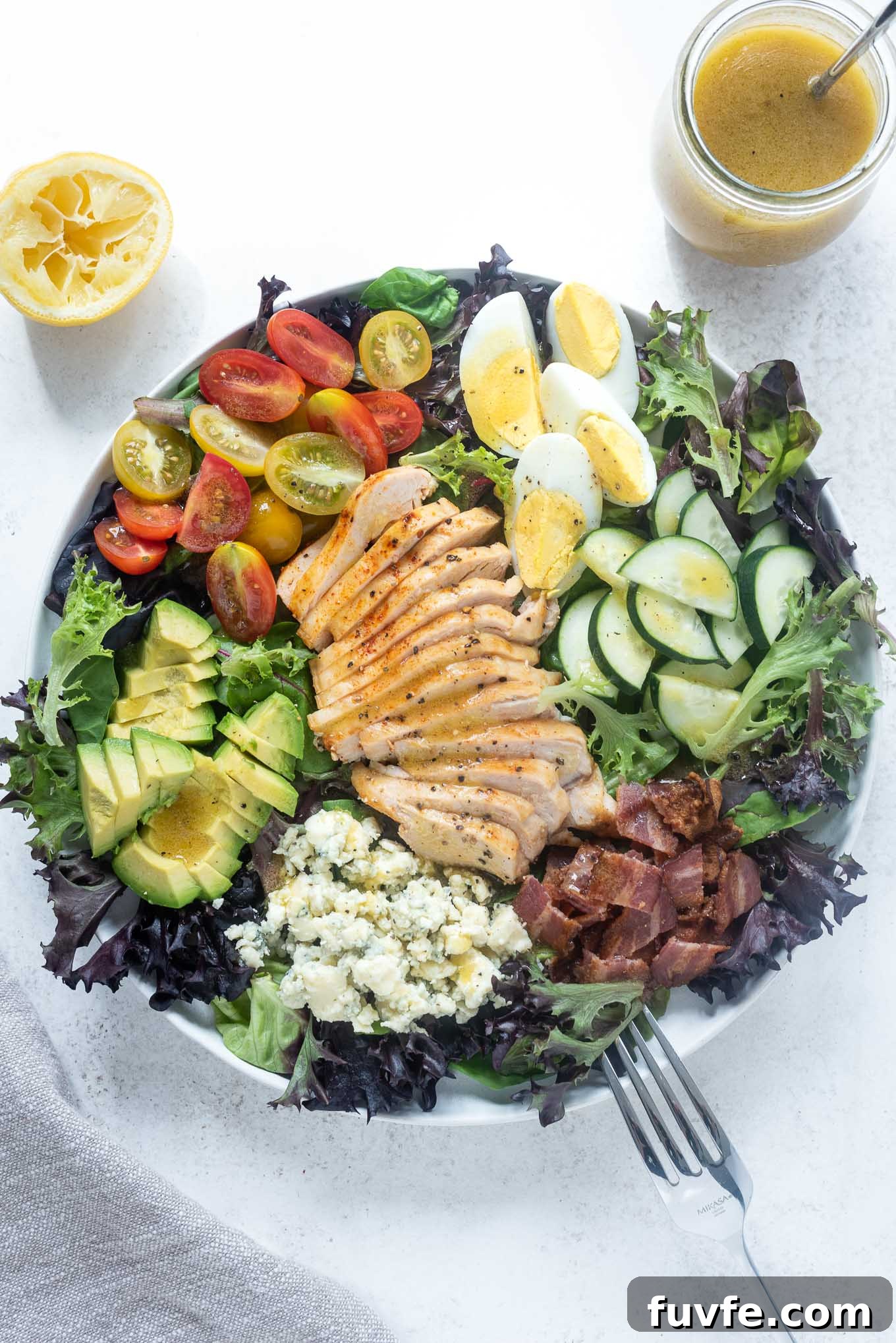 15+ High-Protein Salad Recipes for Filling Lunches and Dinners 5 Chicken cobb salad in a big bowl