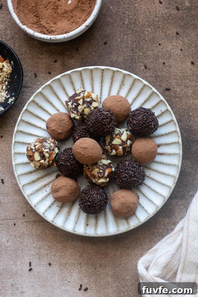 Salted caramel chocolate truffles on a plate.