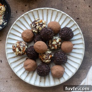 Salted caramel chocolate truffles on a plate.