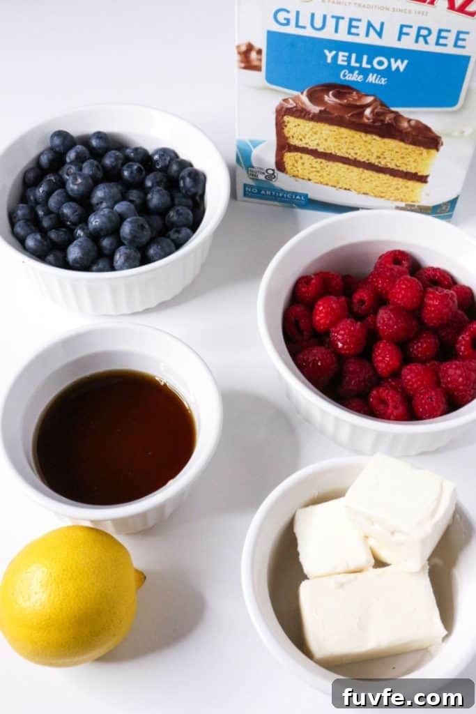 Cake mix, blueberries, raspberries, maple syrup, lemon and butter