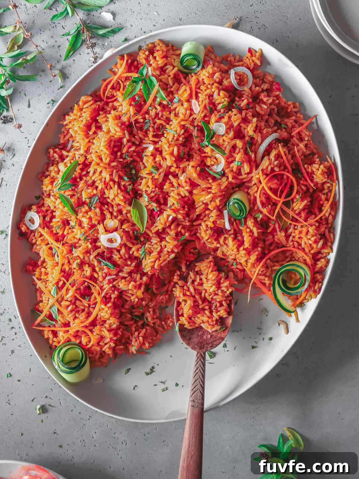 Smoky Nigerian Jollof Rice Recipe – Authentic West African Flavor 2 Nigerian jollof rice on a platter.