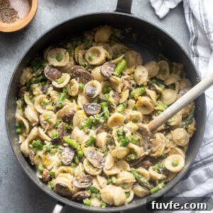 One-Pot Spring Primavera Pasta 10 One pot pasta primavera with spring vegetables in skillet.