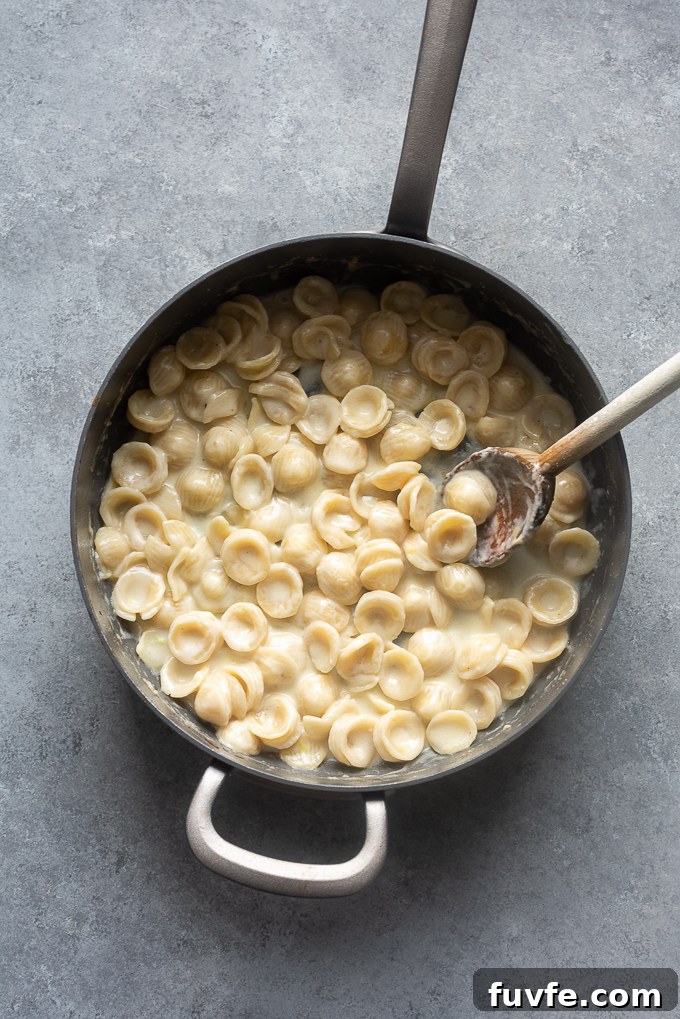 One-Pot Spring Pasta Primavera Recipe with Fresh Veggies 7 Cooked pasta in skillet.