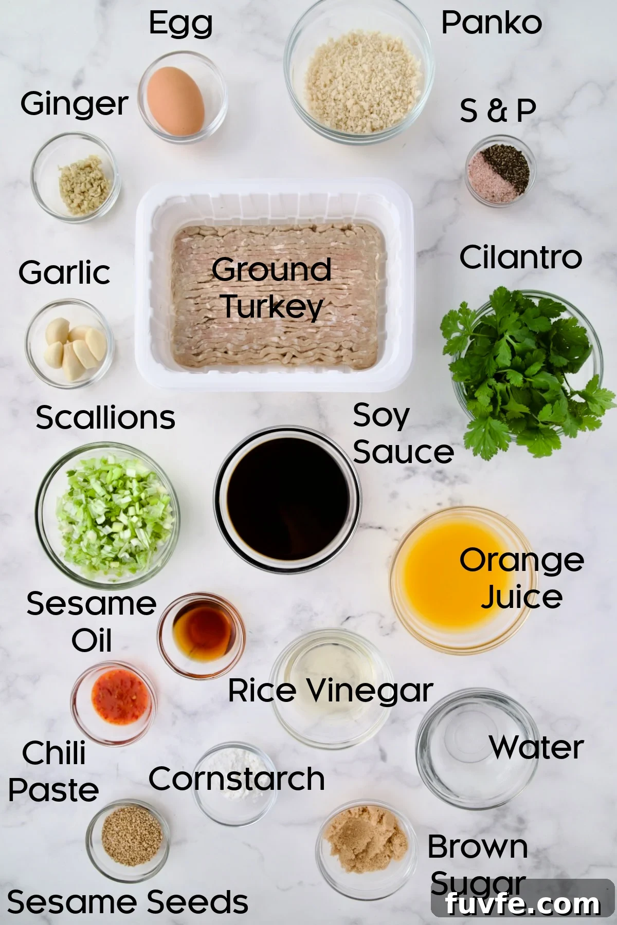 Asian-Style Turkey Meatballs with Ginger-Soy Glaze 4 Ingredients for Asian Turkey Meatballs in glass bowls.