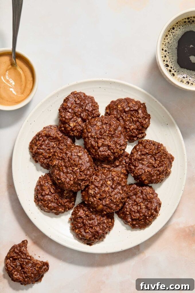 No-Bake Chocolate Peanut Butter Oatmeal Cookies Recipe 3 Chocolate Peanut Butter Oatmeal No Bake Cookies on a plate.