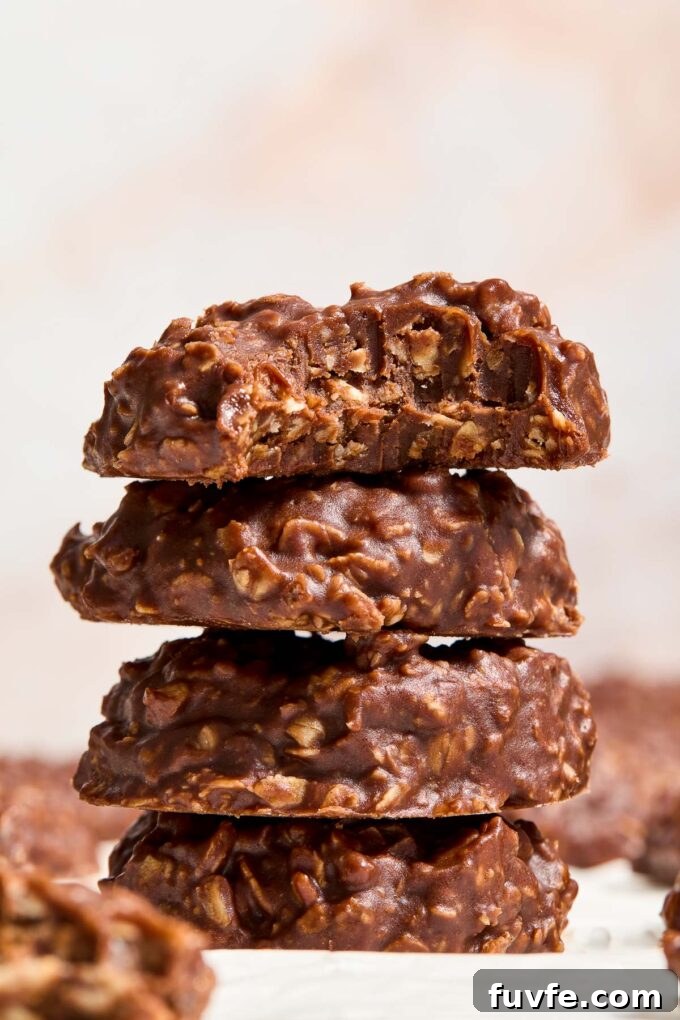 No-Bake Chocolate Peanut Butter Oatmeal Cookies Recipe 9 Stack of no bake chocolate oatmeal cookies with peanut butter.