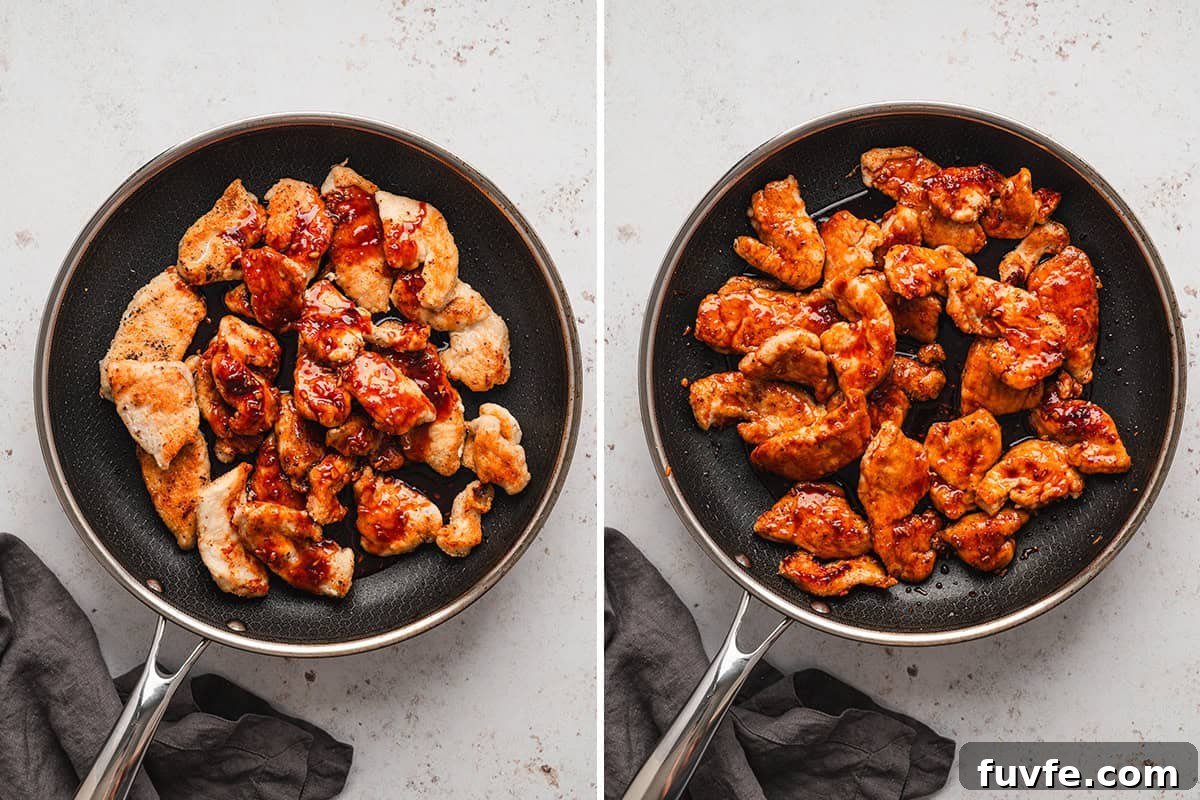 Cooking the chicken in a skillet with the sauce.