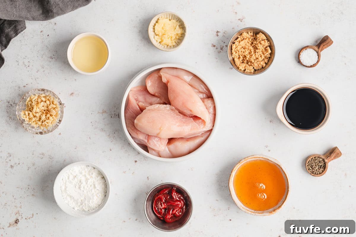 Ingredients to make sweet and spicy sticky chicken.