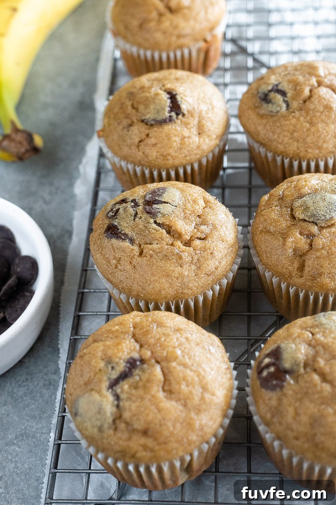 Peanut butter banana oat muffins cooling on a wire rack