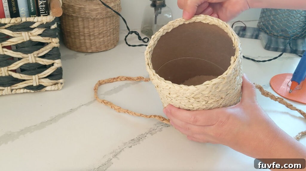 Create a Stunning Ombré Basket: Step-by-Step DIY Guide 9 Finish the rim of your basket with a row of raffia braid on the inside lip of the container.