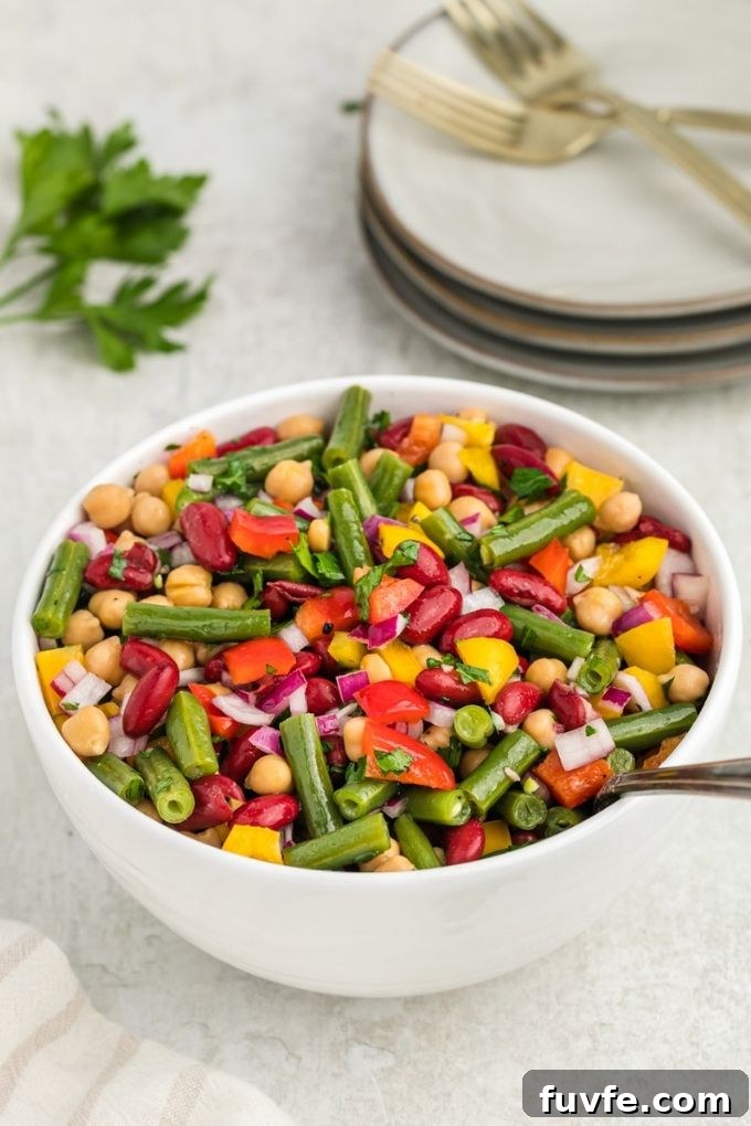 Bowl with three bean salad and parsley on top