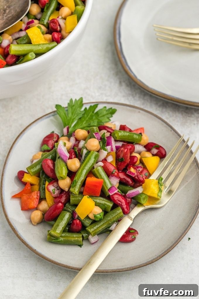 Plate of three bean salad with fork