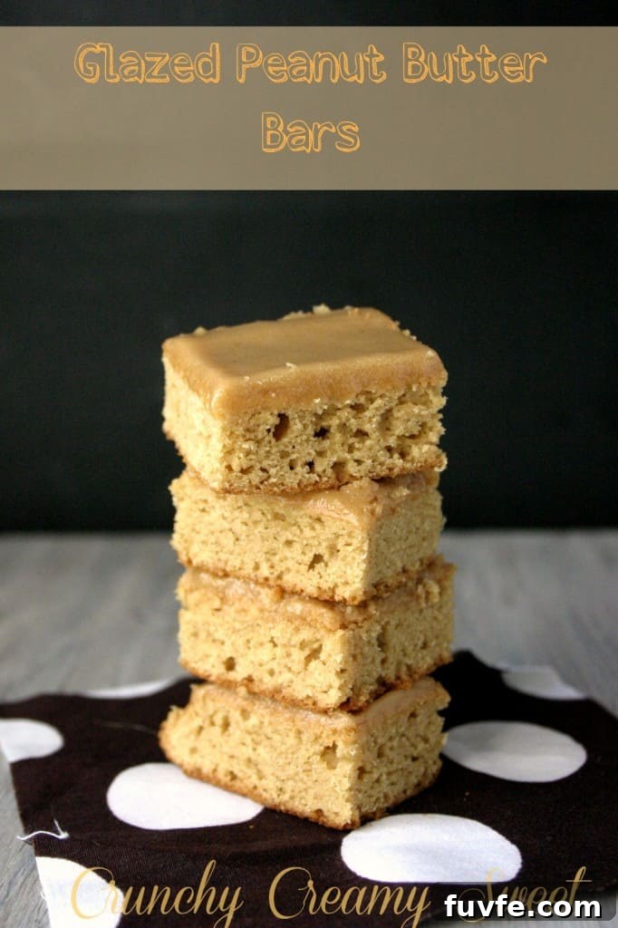 Side shot of a stack of peanut butter glazed bars.