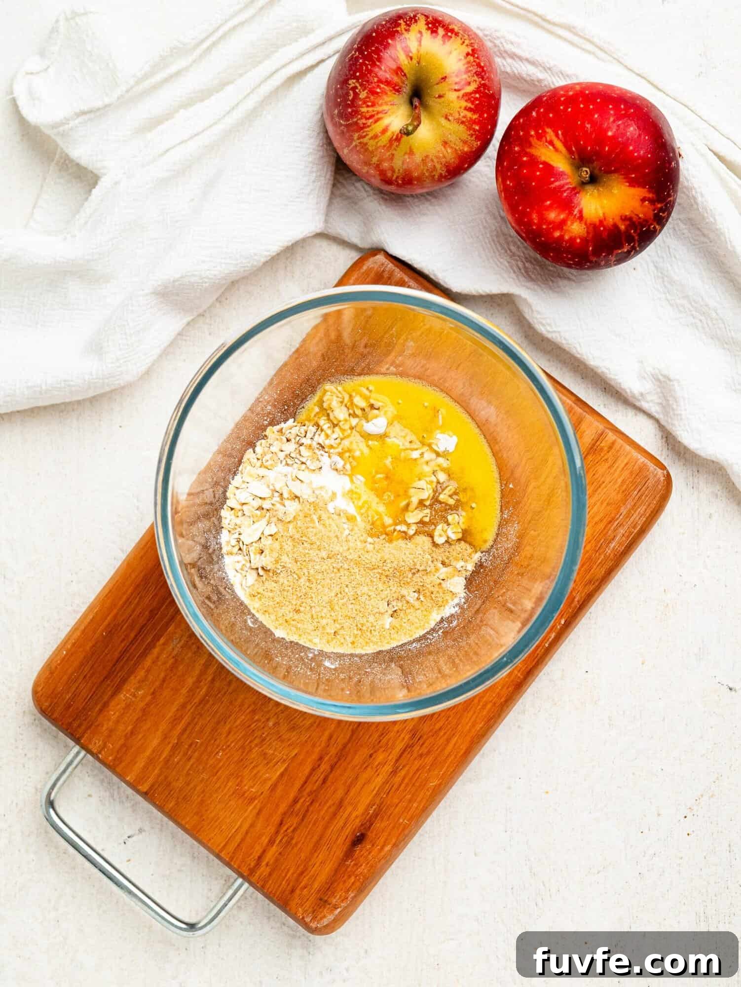 Healthy crumble topping ingredients in a bowl.