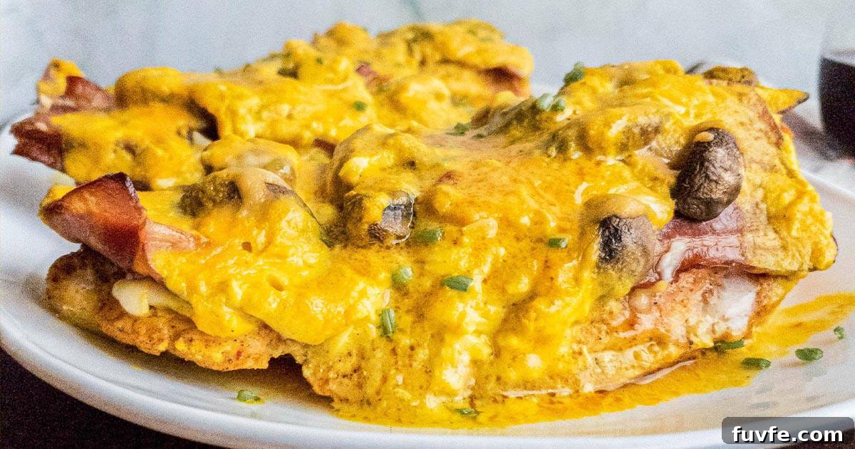 Plate of Alice Springs copcat chicken with mushrooms, bacon and sauce.
