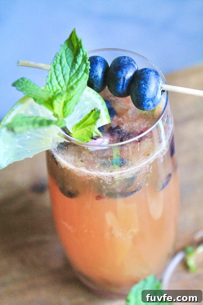 refreshing mango gin fizz