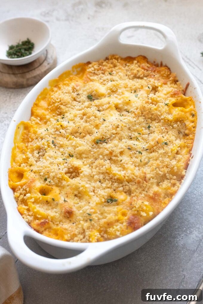Butternut squash macaroni and cheese in baking dish.