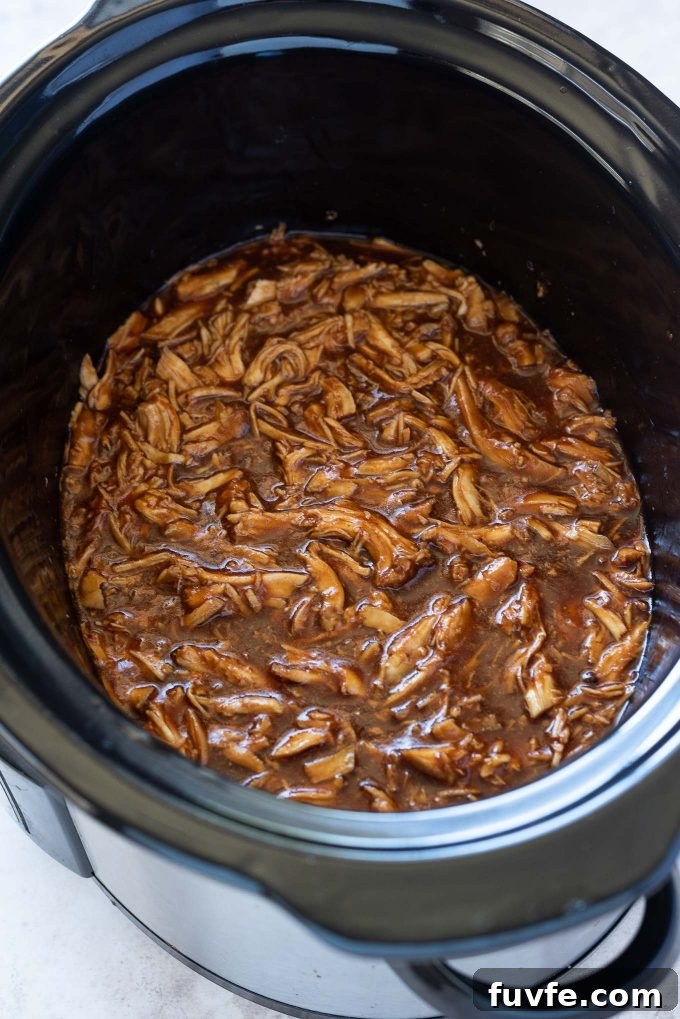 Slow Cooker BBQ Pulled Chicken Sandwiches 2 BBQ pulled chicken in slow cooker