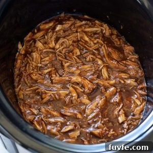 Slow Cooker BBQ Pulled Chicken Sandwiches 6 BBQ pulled chicken in slow cooker