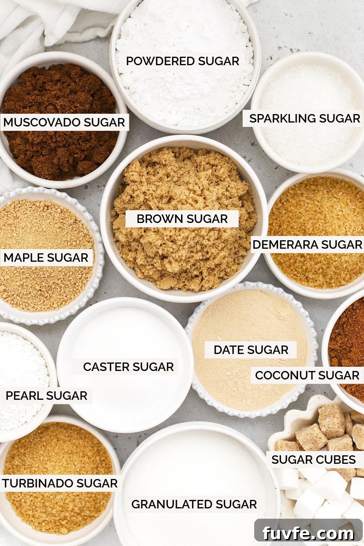 Is Sugar Gluten-Free? What You Need to Know About Sugars and Gluten 7 different kinds of sugar in white bowls with labels