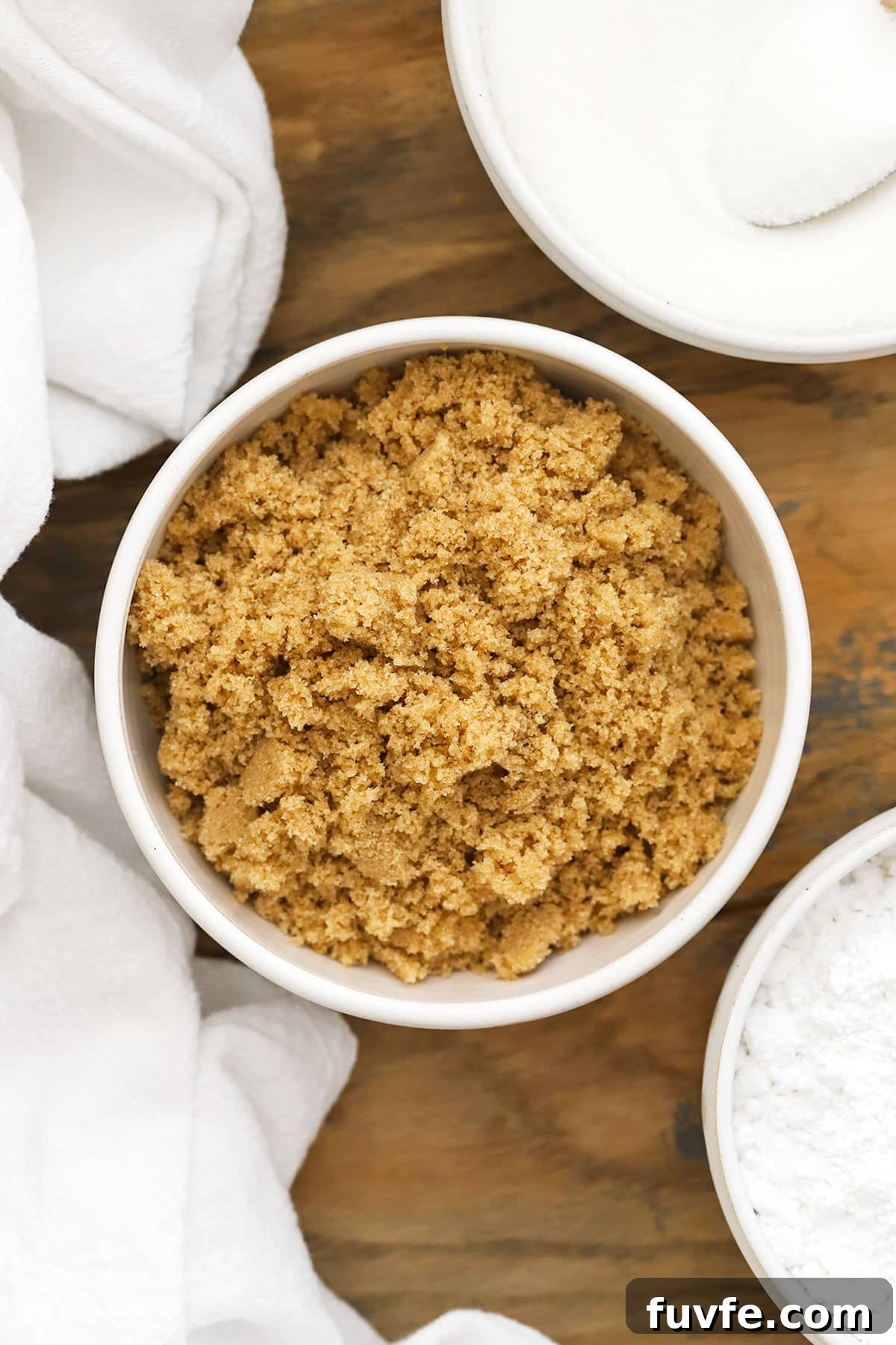Is Sugar Gluten-Free? What You Need to Know About Sugars and Gluten 8 brown sugar, white sugar, and powdered sugar in white bowls