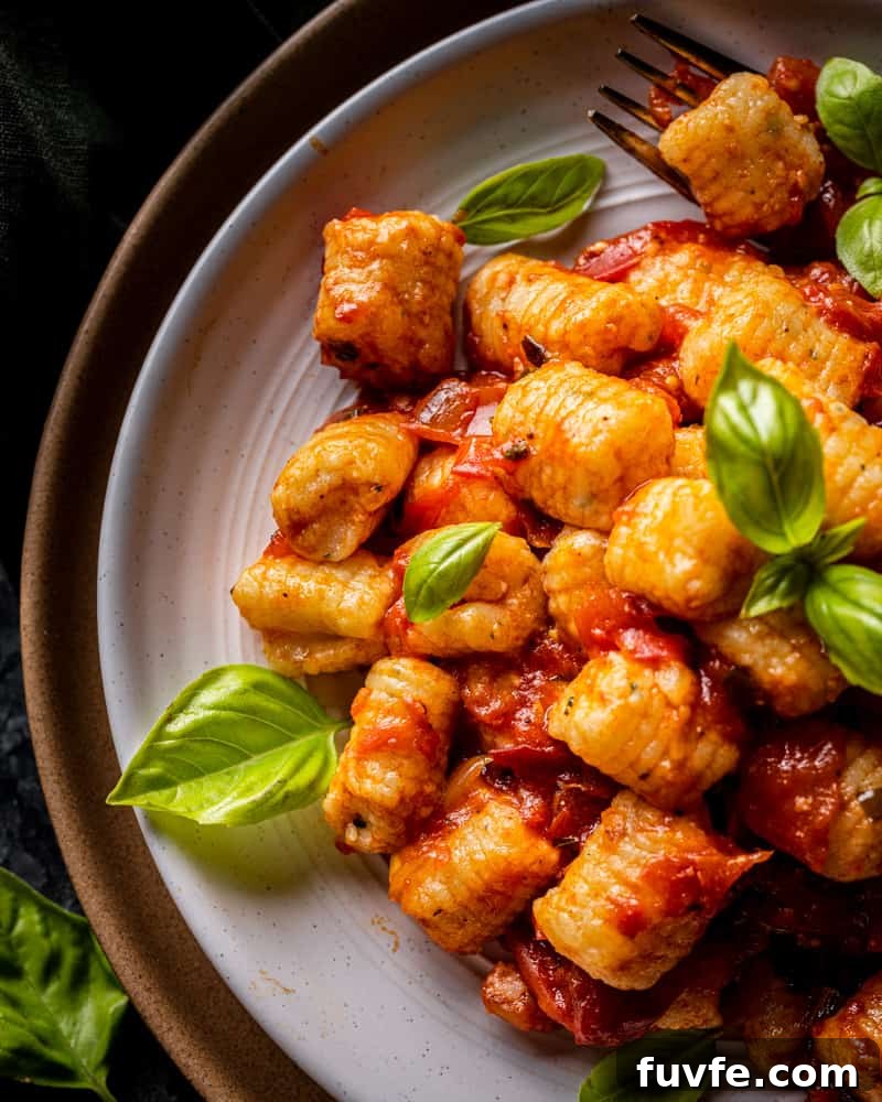 Homemade Potato and Herb Gnocchi Recipe for Perfect Texture 3 Homemade Potato Gnocchi with Fresh Tomato Sauce