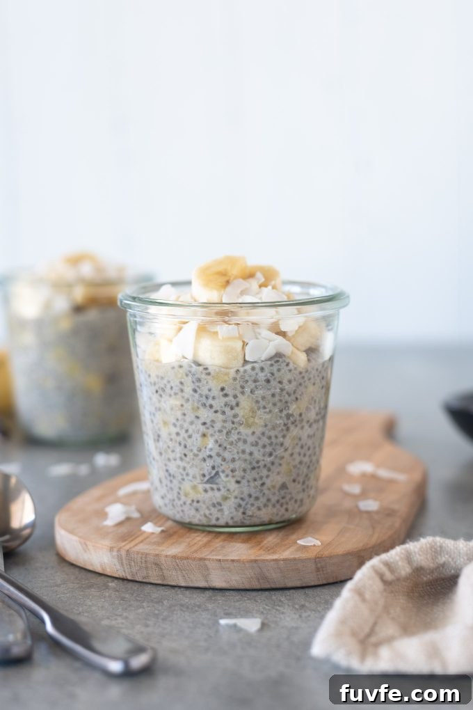 Creamy Banana Chia Seed Pudding Recipe 2 Jar of banana chia pudding on a cutting board
