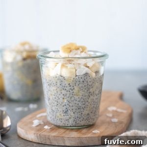 Jar of banana chia pudding on a cutting board