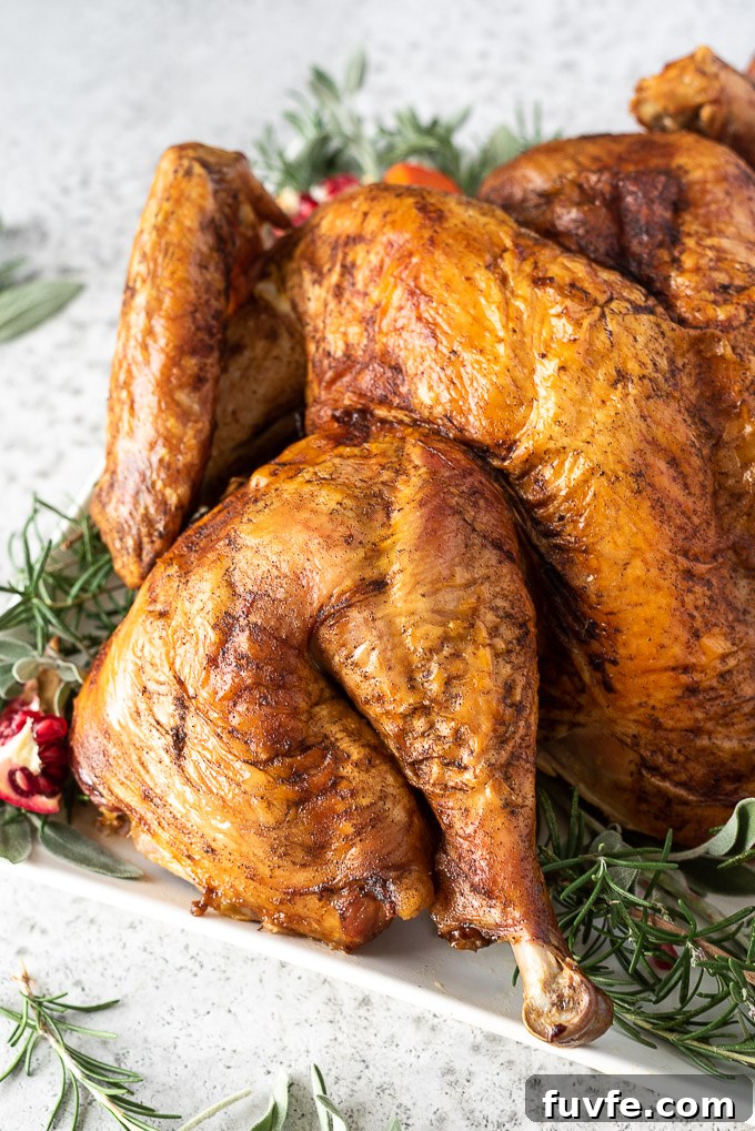 Spatchcock turkey on a white serving platter