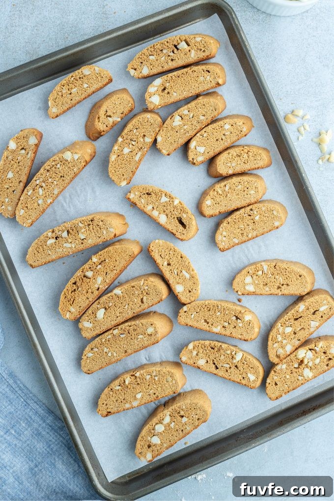 Gingerbread Biscotti Recipe for Holiday Mornings 6 Gingerbread biscotti on a baking sheet