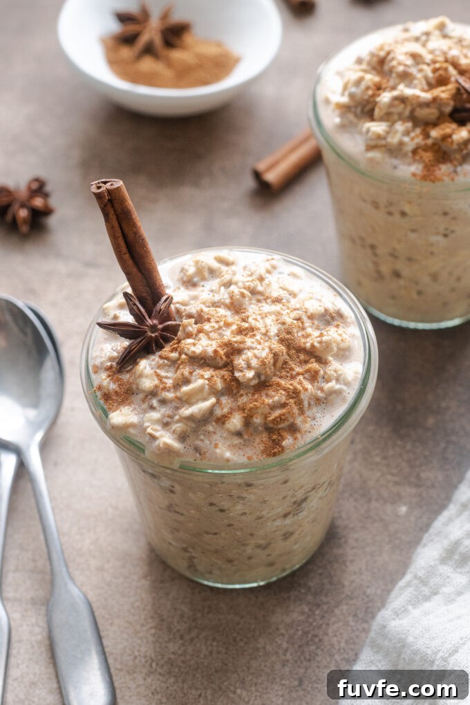 Creamy Spiced Chai Overnight Oats Recipe 5 Chai Overnight Oats in a jar with cinnamon stick and star anise.